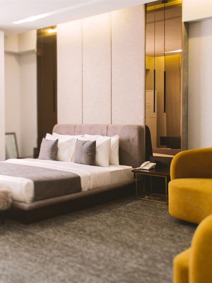 Spacious executive room at LEORK Hotels Rawalpindi, ready for corporate guests.