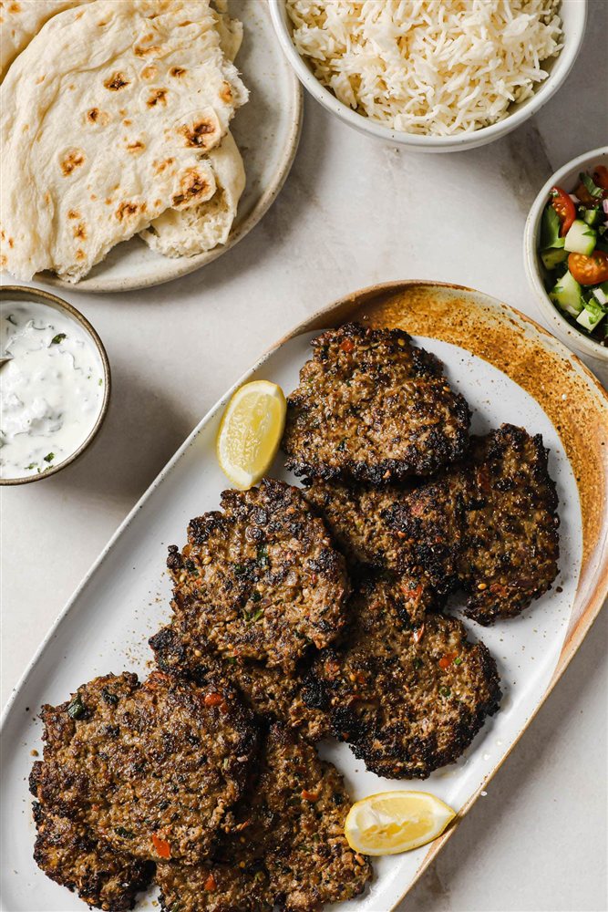 Chapli kebab platter with naan, a must-try food in Kalam