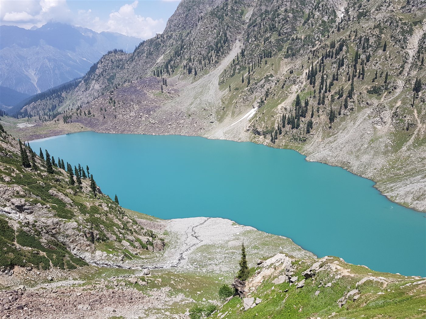 Turquoise water of Kundol Lake above Utror Valley near Kalam
