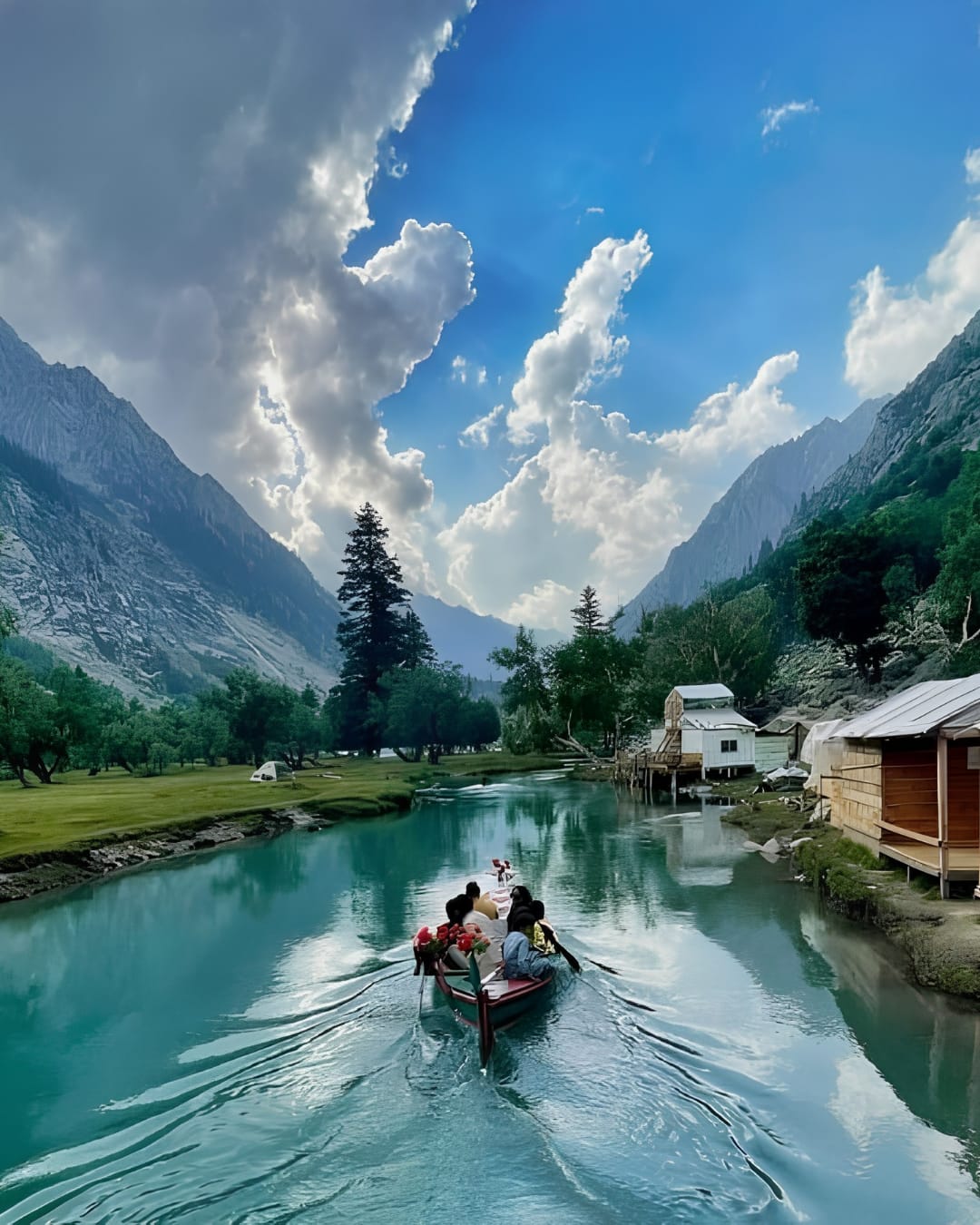 Boating on turquoise water at Shahi Bagh near Gabral, Kalam Valley
