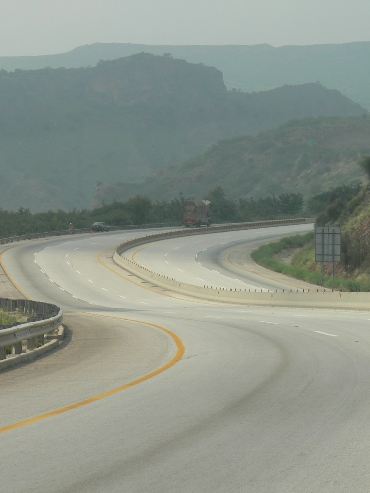 The M-2 motorway curving through the Salt Range hills between Lahore and Islamabad.