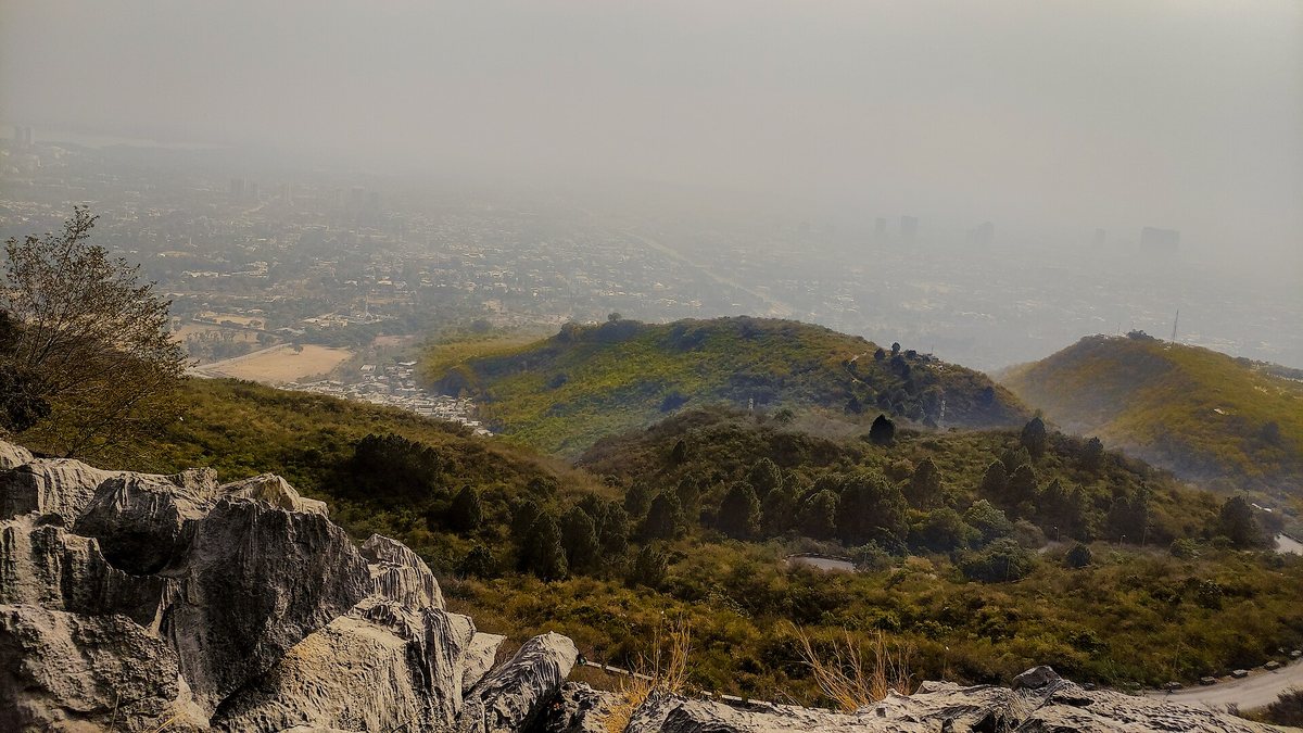 View over Islamabad in winter haze from Trail 4 in the Margalla Hills