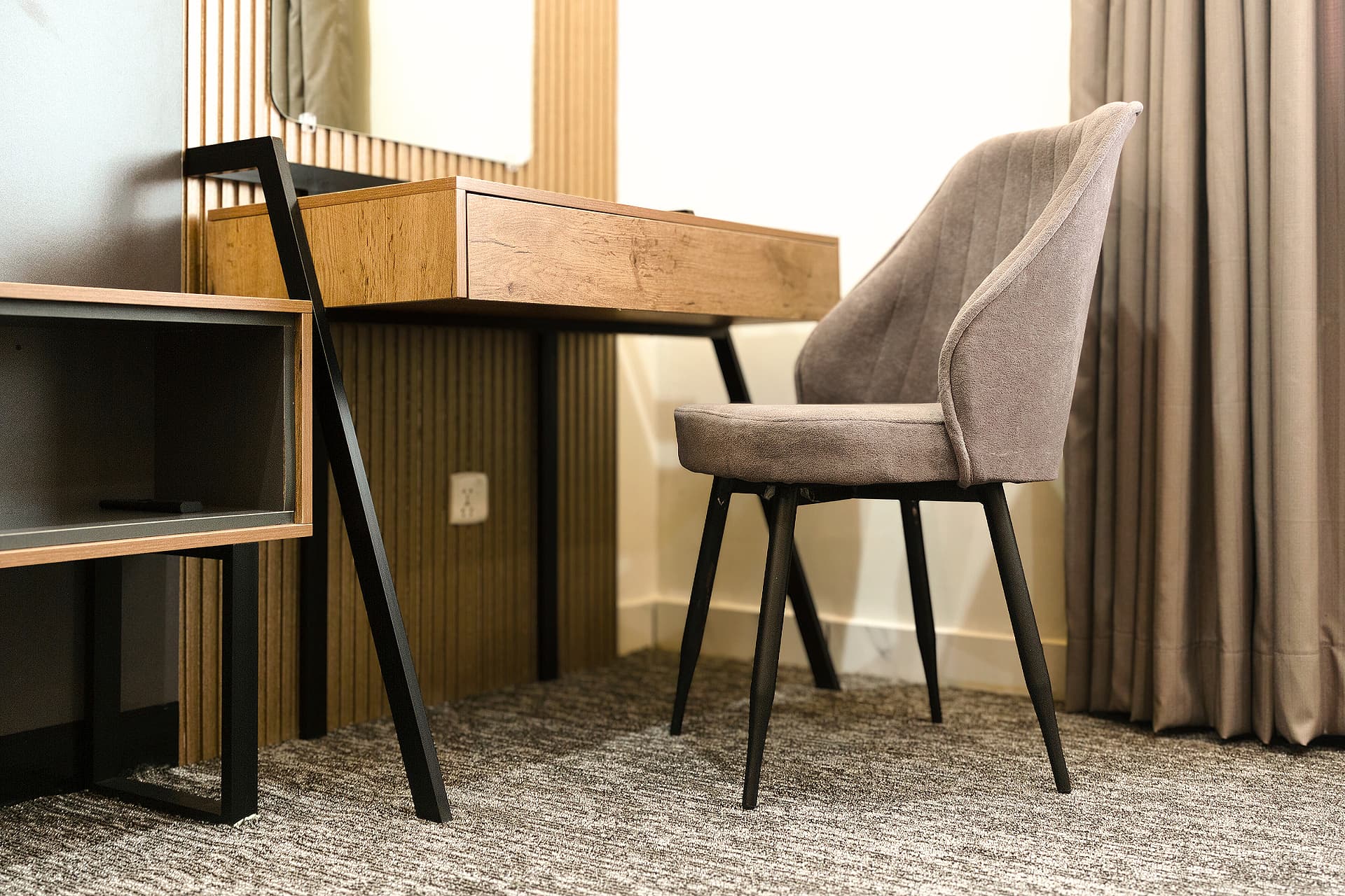 King Room dresser and study table with media wall at LEORK Hotels Rawalpindi Islamabad